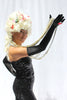 Our model is wearing the black satin opera gloves.