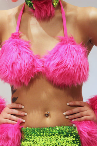 Our model is wearing the fur bikini top in Fuchsia.