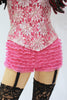 Our model is wearing the Ruffle Underwear in Bubblegum Pink.