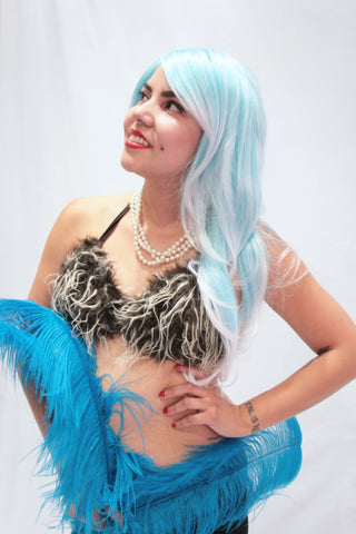 Our model is wearing the high-end fur bikini top in Wild Thing.