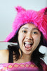 Our model is wearing the Fur Kitty Hat in Fuchsia.