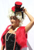 Our model is wearing the Red and Black Ringleader Mini Top Hat.