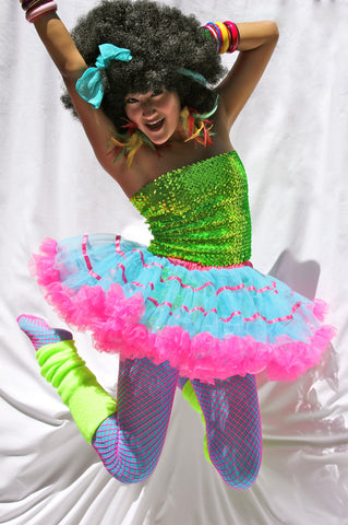 Our model is wearing the Turquoise and Pink Layered Satin Striped Tutu.