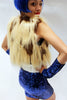 Our model is wearing the High-End Fur Bolero Vest in Camel Long.