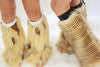 Our models are wearing the High-End Fur Leg Warmers in Camel Long and Blonde Raccoon.