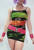 Our model is wearing sequins belts in Neon Green, Neon Orange and Neon Pink.