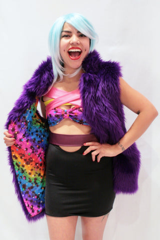 Our model is wearing the Fur Vest in Purple with Galaxy lining.
