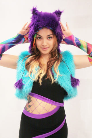 Our model is wearing the Faux Fur Kitty Hat in Purple.