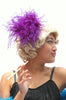 Our model is wearing the Ostrich Feather Hairclip in Purple.