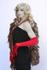 Our model is wearing the red satin opera gloves.