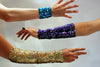 Purple AB medium sequins cuffs shown in the middle.
